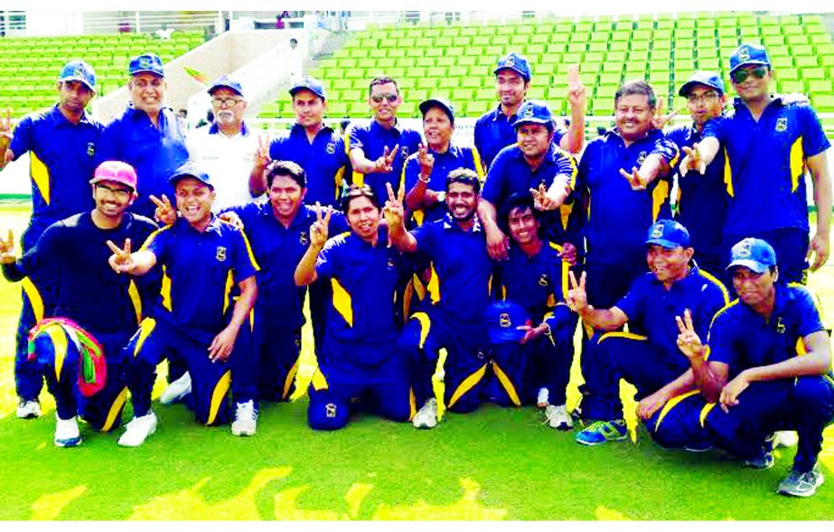 Members of Bangladesh Sports Press Association showing victory sign after beating Indian High Commission team by nine runs in a friendly Twenty20 Cricket match at the Sher-e-Bangla National Cricket Stadium in Mirpur on Friday.