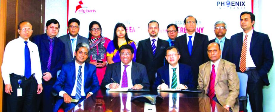 Sohel R. K. Hussain, Managing Director and M Jamirul Islam, Managing Director of Phoenix Insurance Company Ltd, signing an agreement of"Bankers Blanket Bond", a new insurance service in Bangladesh recently. Mohammad Mahbubur Rahman, Chief Financial Off