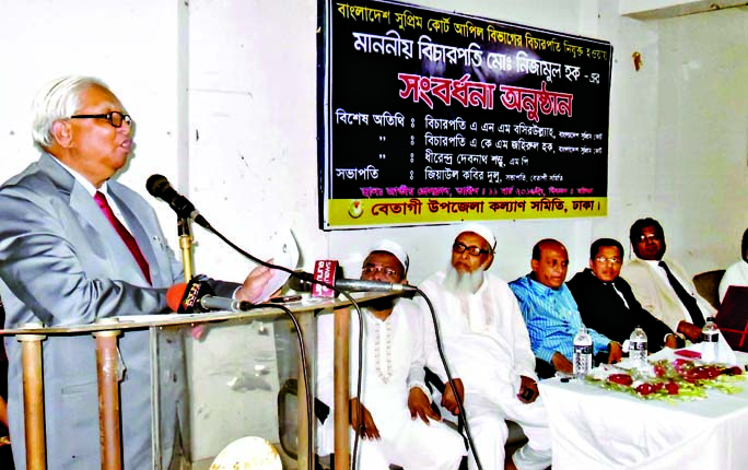 Justice Nizamul Haque speaking at a reception accorded to him at a ceremony organized by Betagi Upazila Kalyan Samity, Dhaka at Jatiya Press Club on Friday.