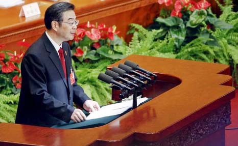 Zhou Qiang, President of China's Supreme People's Court, gives a speech during the third plenary session of the National People's Congress (NPC) at the Great Hall of the People, in Beijing, China on Sunday.
