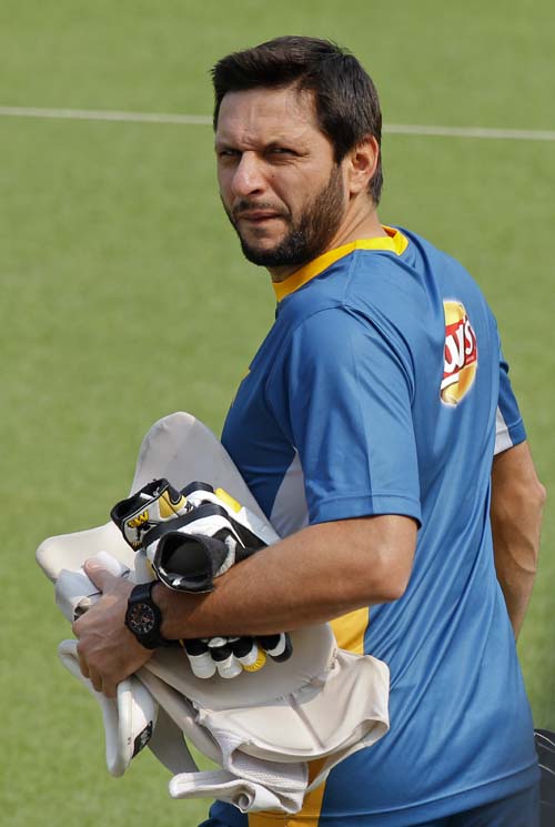 Pakistan's Shahid Afridi walks in for a training session ahead of their practice match of the ICC World Twenty20 2016 cricket tournament in Kolkata, India, Sunday.