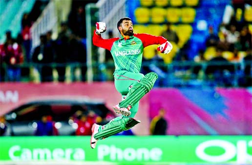 Tamim Iqbal is pumped up after reaching his maiden T20 international century against Oman in Group A World T20 qualifiers at Dharamsala on Sunday.