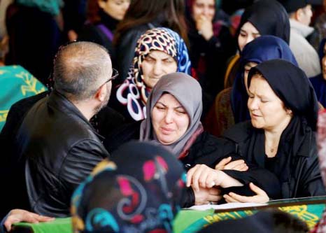 Family members and relatives of a car bombing victim mourn in a mosque in Ankara, Turkey, on Monday.