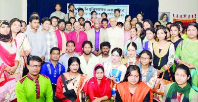 GAZIPUR: Dr Harun-ur Rashid, VC, National University posed for photograph with students of different universities after the final round of Inter- College Cultural Competition at Govt Music College Auditorium on Saturday.