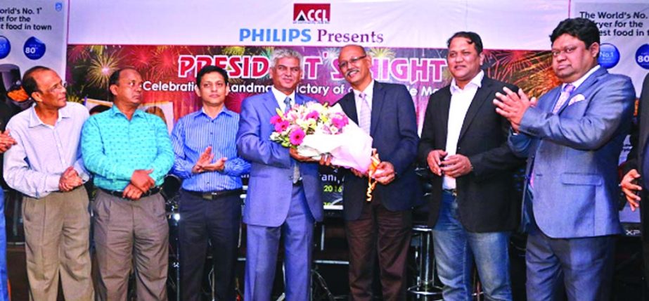 ACCL President KM Alamgir Iqbal, presenting a flower bouquet to Sanjay Bapna, CEO Philips Electronics Bangladesh Pvt Ltd, a wholly owned subsidiary of Royal Philips Netherlands, at a local Club in Dhaka recently. IPE Technologies Ltd, Authorized National
