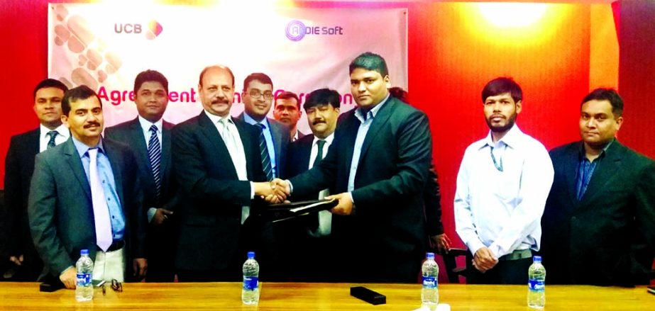 Mirza Mahmud Rafiqur Rahman, Additional Managing Director of United Commercial Bank Limited and Shakib Rabbani, Managing Director of Addie Soft Ltd sign an agreement at the bank's corporate office on Tuesday.
