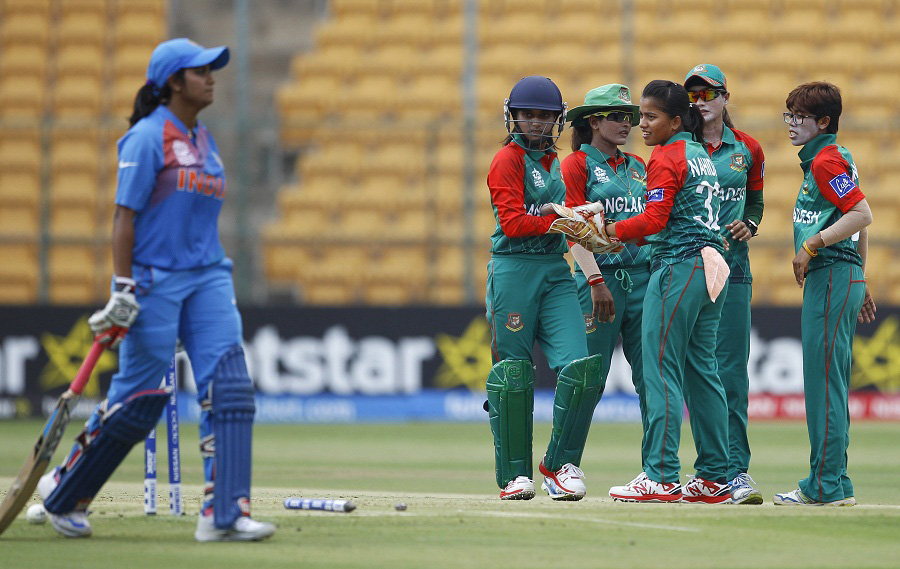 Bangladesh players celebrate the dismissal of India's Vellaswamy Vanitha (left) during their ICC Women's Twenty20 2016 Cricket World Cup in Bangalore, India on Tuesday.