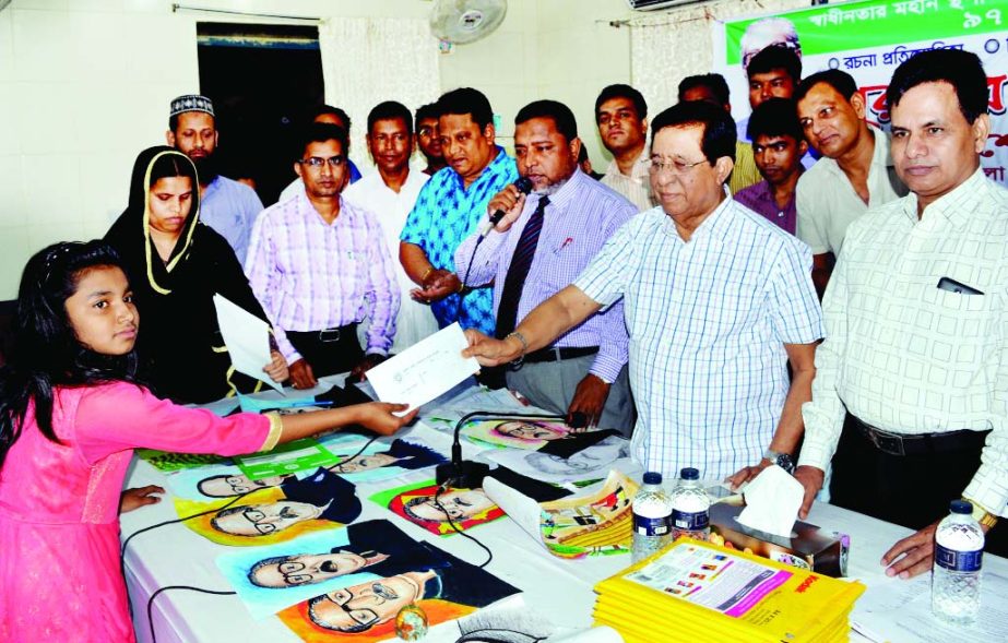 KHULNA; Sheikh Harun-ur -Rashid, Administrator, Khulna Zilla Parishad distributing prizes among the winners of essay, art and recite competition of primary, high and higher secondary students organised to mark the National Children's Day and birth anniv