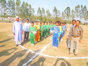 Adolescent girls of Polashbari High School and Poroshmoni High School under Polashbari union in Nilphamari district standing side by side with their respective teachers before starting their match. Manusher Jonno Foundation, Dhaka based donor organizatio