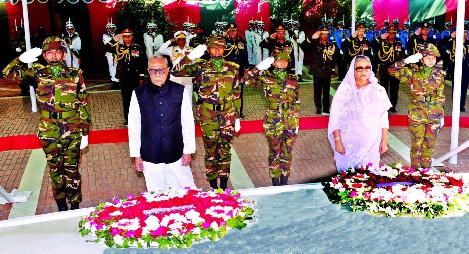 President Abdul Hamid and Prime Minister Sheikh Hasina standing after placing wreaths at the altar of the Mazar of Bangabandhu Sheikh Mujibur Rahman marking his birth anniversary and National Children's Day