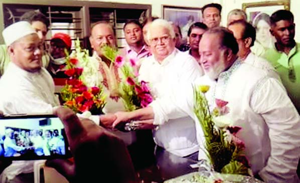DOHAR (SAVAR): Prof M A Hannan Khan, Chairman candidate from Awami League is being greeted by politician and Industrialist Salman F. Rahman, former minister Barrister Nazmul Huda and other politicians at a ceremony at Moksedpur Union on Saturday.