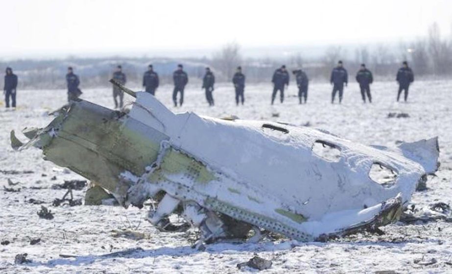 Emergencies Ministry members work at the crash site of a Boeing 737-800 Flight FZ981 operated by Dubai-based budget carrier Flydubai, at the airport of Rostov-On-Don, Russia, on Sunday.