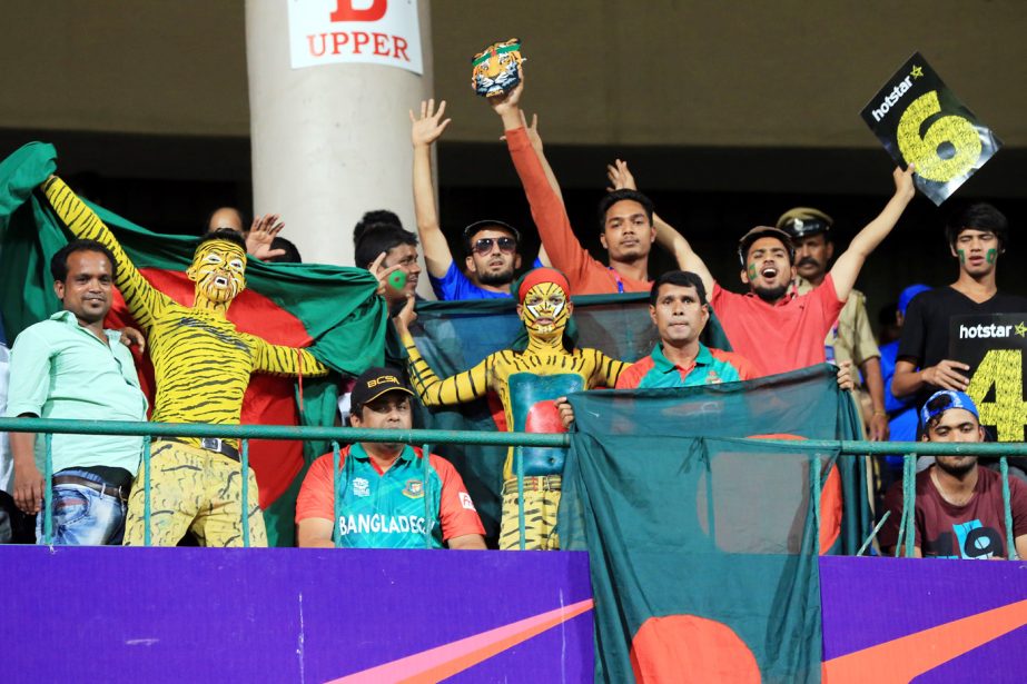 Fans of Bangladesh Cricket team enjoing the World T20, Group 2 match between Australia and Bangladesh at Bangalore in India on Monday. Bangladesh scored 156 for 6 in 20 overs.
