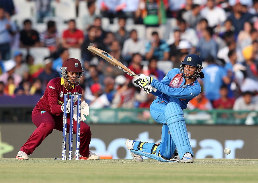 Smriti Mandhana plays the sweep during the Women's ICC World Twenty20 match between West Indies and India at IS Bindra Stadium in Mohali, India on Sunday.