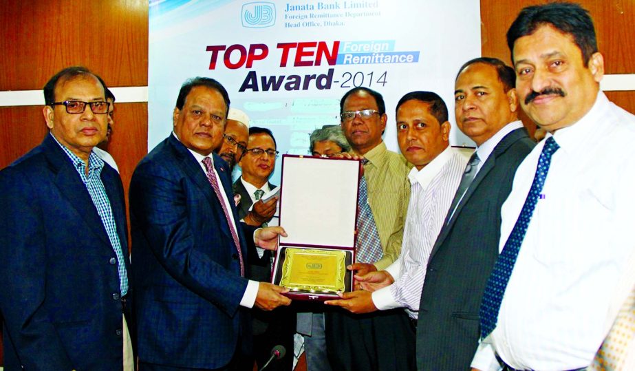 Shaikh Md. Wahid-uz-Zaman, Chairman of Janata Bank Limited hands over the "Top Ten Foreign Remittance Award-2014" to the winning branches of JBL at its head office in city recently. Md. Abdus Salam, CEO & MD, Hasan Iqbal, DMD, Mohammad Fakrul Alam, GM,
