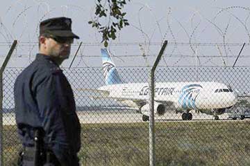 A hijacked Egypt Air A320 airbus stands on the runway at Larnaca Airport in Larnaca, Cyprus, yesterday.