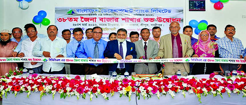 Md. Yeasin Ali, Chairman of Bangladesh Development Bank Limited (BDBL) cuts tape of its 38th branch at Jainabar, Gazipur on Monday. Managing Director (Additional Charge) Mohammad Jalaluddin, Deputy Managing Director Md. Wahiduzzaman Khandaker, General Man
