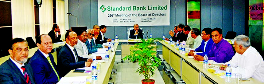 Kazi Akram Uddin Ahmed, Chairman of the Board of Directors of Standard Bank Ltd. presides over the 250th Board Meeting of the bank. Other directors of the bank also take part in the meeting held on Wednesday in the city.