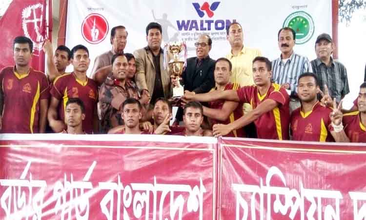 Border Guard Bangladesh, the champions of the Liberation War Affairs Ministry-Walton Independence Day Kabaddi Competition with the guests and the officials of Bangladesh Kabaddi Federation pose for a photo session at the Kabaddi Stadium on Thursday.