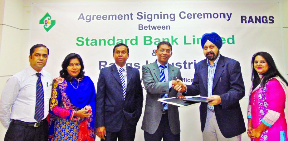 M Ahsan Ullah Khan, EVP & Head of HRD of Standard Bank Limited and Iminder Singh Khurana, Chief Operating Officer of Rangs Industries Ltd, sign an agreement in the city. Under this agreement SBL Credit cardholders can enjoy EMI facility up to 12 months at