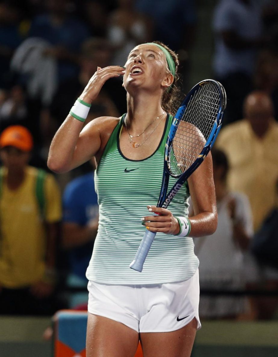 Victoria Azarenka of Belarus celebrates her victory against Angelique Kerber of Germany after the semifinals of the Miami Open tennis tournament in Key Biscayne, Fla on Thursday.