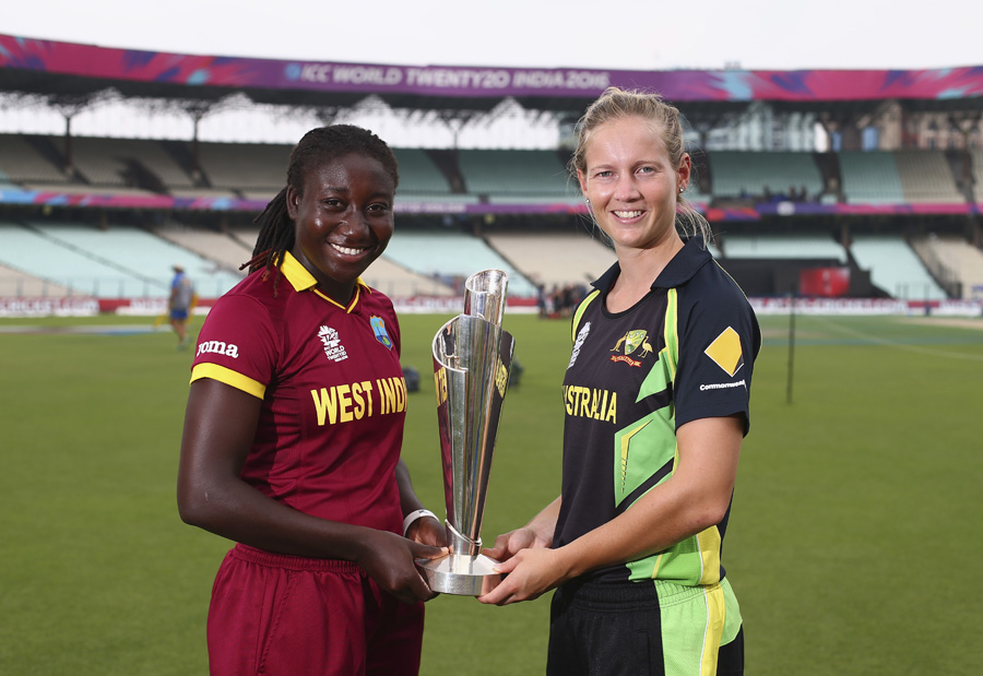 Stafanie Taylor, Captain of the West Indies and Meg Lanning, Captain of Australia pose with the Trophy during previews ahead of the Women's ICC World Twenty20 final between Australia and West Indies in Kolkata, India on Saturday.