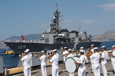 A Philippine navy band plays during a welcoming ceremony for Japanese destroyer JS Ariake, at a port of the former US naval base in Subic bay, north of Manila, on Sunday.