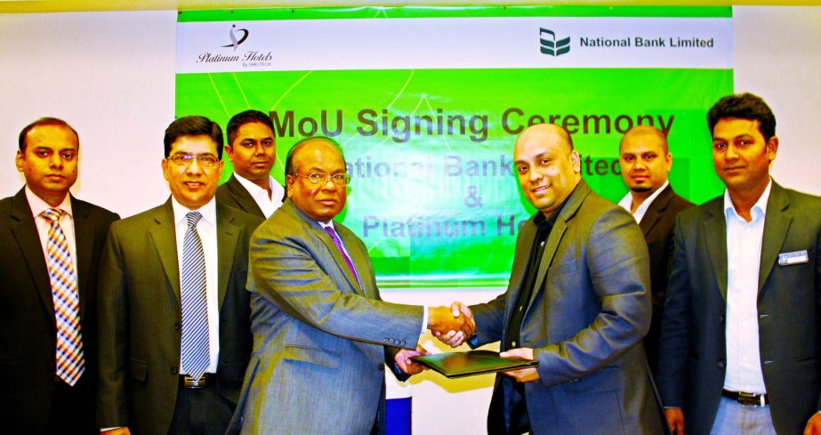 M A Wadud, Deputy Managing Director of National Bank Limited & Mohammad Ali Tinku, General Manager of Platinum Grand Hotel, Banani, exchanging Memorandum of Understanding (MoU) recently at Bank's Card Division, Shimanto Square, 80 Pilkhana, Dhaka. Under