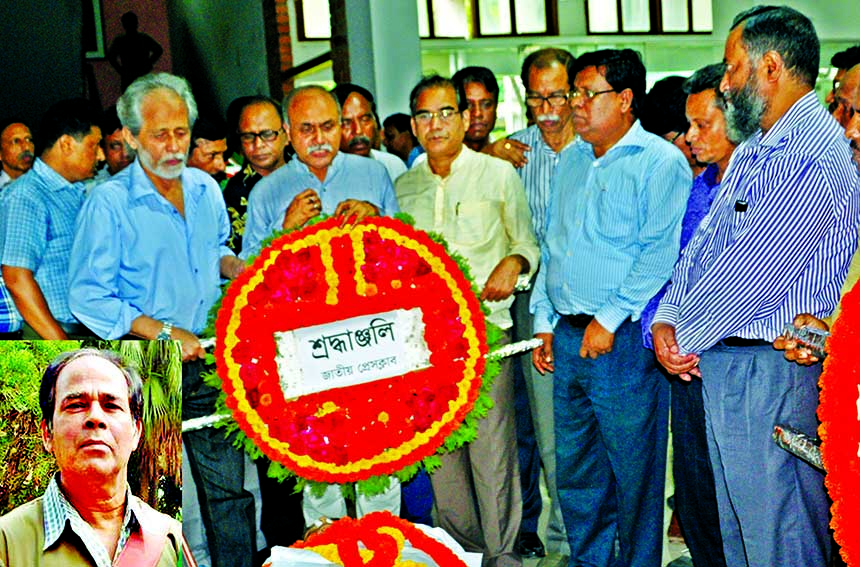 Different organisations including Jatiya Press Club (JPC) Managing Committee paid last respect to JPC member and veteran photojournalist Shamvunath Nandi (Inset) by giving bouquets on his coffin at the club premises on Monday.