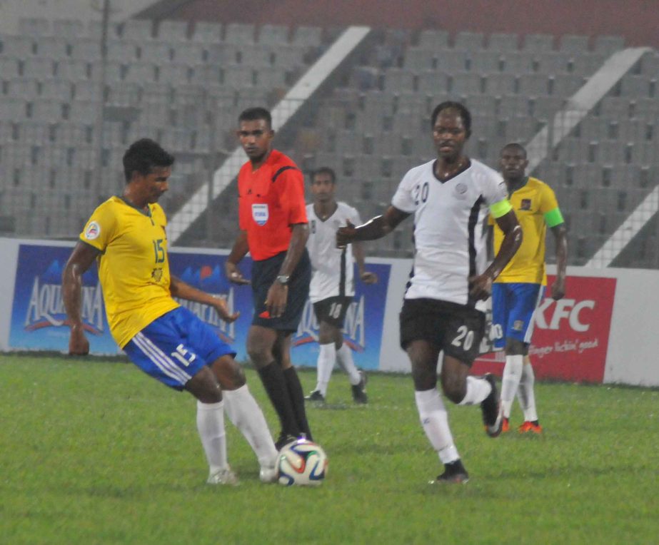 An action from the KFC Independence Cup Football match between Sheikh Jamal Dhanmondi Club and Dhaka Mohammedan SC at the Bangabandhu National Stadium on Monday.