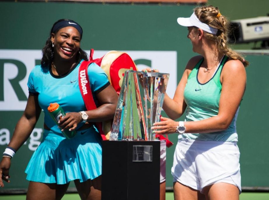 Serena Williams (L) speaks with Victoria Azarenka after the women's final of the BNP Paribas Open at the Indian Wells Tennis Garden on March 20, 2016, where Azarenka defeated Williams.