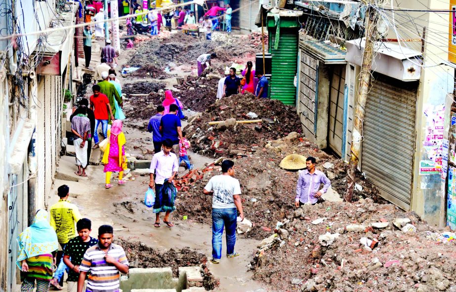 Road digging by government agencies, including the WASA, with the advent of monsoon creates commuters' sufferings. This photo was taken from in front of the Tara Mosque in old Dhaka's Becharam Deuri where it was seen that the road is unfit for vehicular