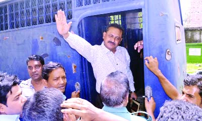 RAJSHAHI: Former Mayor Rajshahi Mosadek Hossain Bulbul waving hands while leaving court premises after a hearing at Rajshahi CMM Court yesterday.