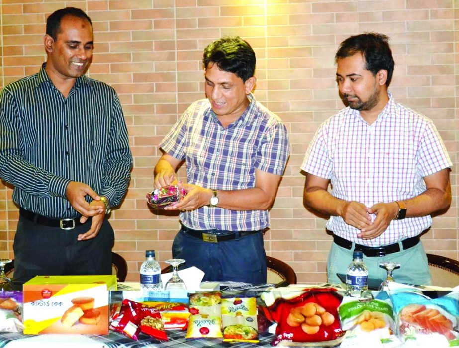 Managing Director of Well Group Syed Sirajul Islam Komu and Director Syed Asif Hasan unveiling the three new brand Morning Fresh Horlicks,Ovaltin and Nimky Biscuits at the conference Hall of Well Park Residence on Thursday. DGM Marketing of the company M