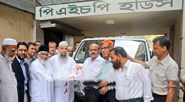 Chairman of PHP Group Sufi Muhammad Mizanur Rahman handing over key of a microbus for the autism students of Spectra School of Autism, Chittagong on Thursday.