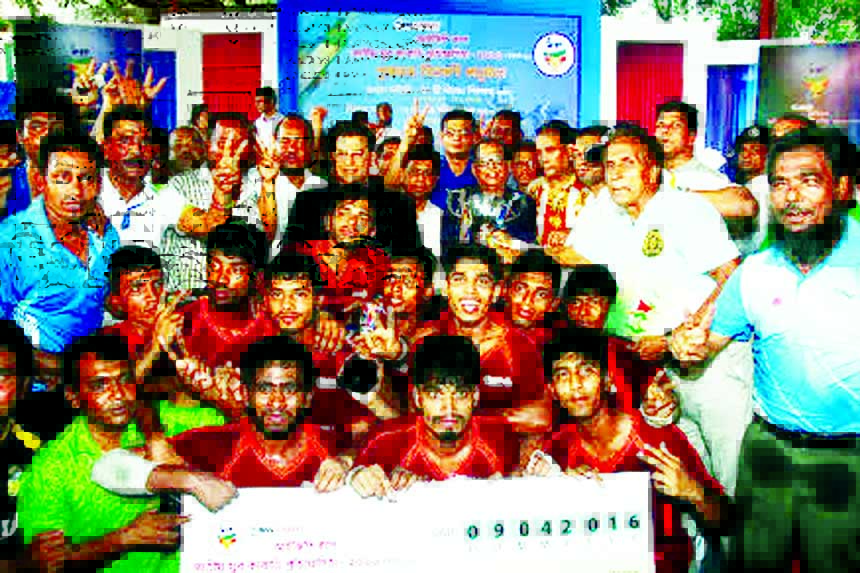Members of Comilla District team, the champions of the BBS Cables IGP Cup National Youth Kabaddi Competition with the guests and officials of Bangladesh Kabaddi Federation pose for a photo session at the Kabaddi Stadium on Saturday.