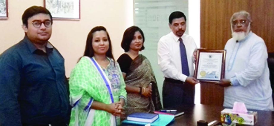 Jayson Pharmaceuticals Ltd. (JPL) wins QMS ISO 9001:2015 certification, first of its kind in Bangladesh recently. Md. Salimullah, MD of JPL receives the Award from Ekramul Haque, ISO Consultant. Azra Salim, Nafiza Salim & Enam Mallik-Directors of JPL were