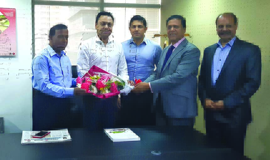 Members of Board of Directors and Management of United Commercial Bank Limited (UCB) welcome Shawkat Aziz Russell, the newly elected Executive Committee Chairman of UCB at the bank's head office on Tuesday. Md Jahangir Alam Khan, Risk Management Committe