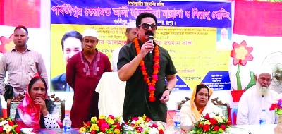 RANGPUR: State Minister for Local Government, Rural Development and Cooperatives Moshiur Rahman Ranga addressing a discussion meeting after launching roof casting works of Parbotipur Keramat Ali Hafizia Madrasa and Lillah Boarding in Rangpur as Chief Gu
