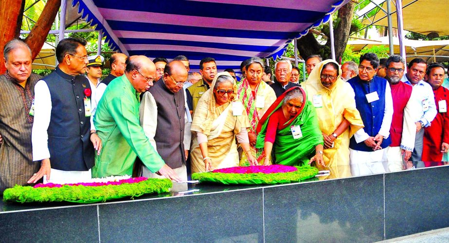 Prime Minister Sheikh Hasina along with ruling party leaders placing wreaths at the portrait of Bangabandhu Sheikh Mujibur Rahman at Bangabandhu Museum in Dhanmondi marking the historic Mujibnagar Day on Sunday.