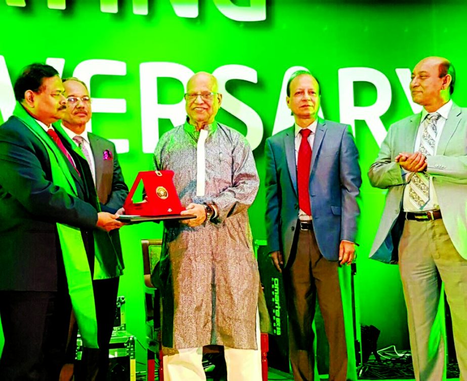 Major General Aziz Ahmed, Director General of Border Guard Bangladesh (BGB) receives special award on Libration War from the Finance Minister Abul Mall Abdul Muhith during the 3rd founding anniversary of NRBC Bank Ltd in the city on Monday. BGB (former EP
