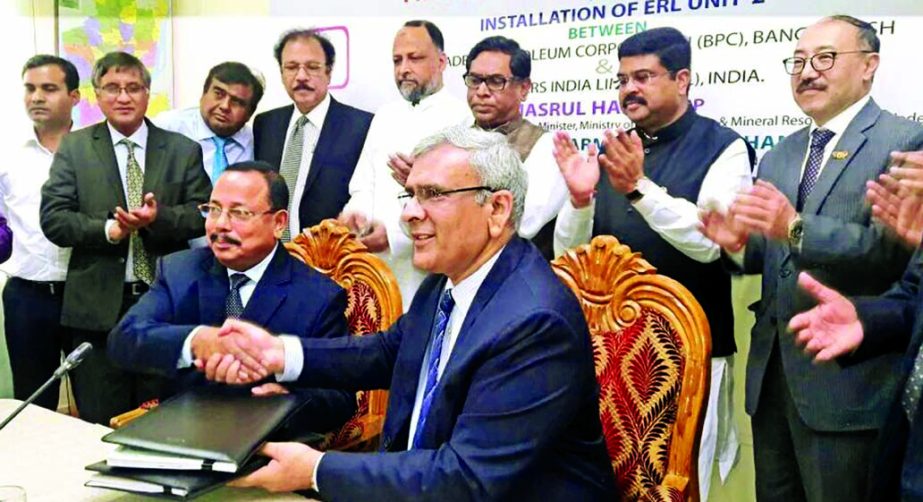 Bangladesh Petroleum Corporation (BPC) and Engineers India Ltd. (EIL) sign a contract on Tuesday for installation of second unit of Eastern Refinery Ltd. in Ctg. Nasrul Hamid MP, State Minister of Power, Energy and Mineral Resource and Dharmendra Pradhan,