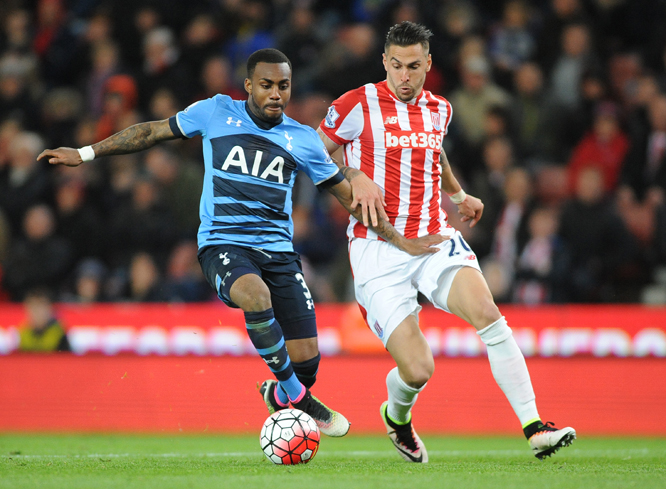 Tottenham's Danny Rose (left) vies for the ball with Stoke's Geoff Cameron during the English Premier League soccer match between Stoke City and Tottenham Hotspur at the Britannia Stadium, Stoke in Trent, England on Monday.