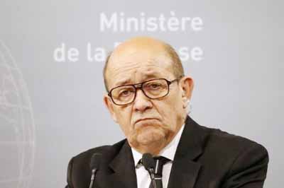 French Defence Minister Jean-Yves Le Drian reacts during a news conference at the French Defence Ministry in Paris, France.