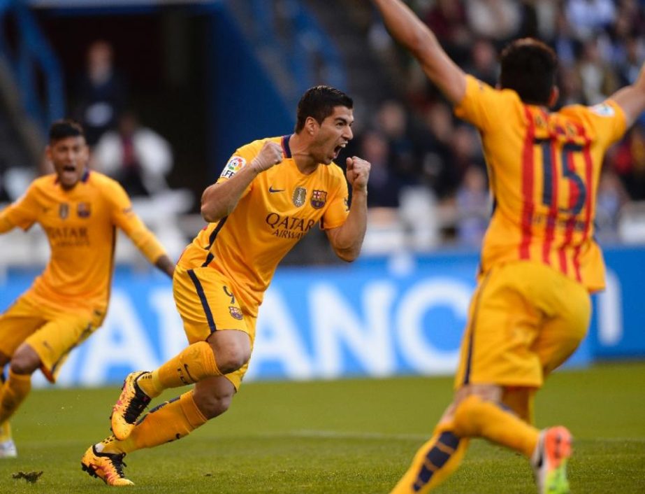 Barcelona's Luis Suarez celebrates after scoring a goal during a Spanish La Liga soccer match on Wednesday.
