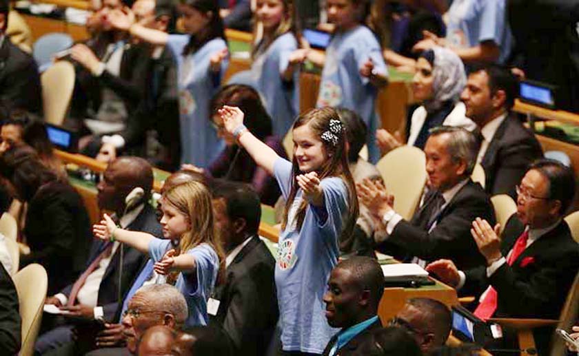 Children from around the world stand in a procession with world leaders and country delegates for the Paris Agreement climate change accord in New York City. AP file photo