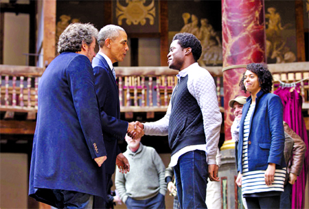 President Barack Obama, 2nd left, greets actors on stage after watching them perform Shakespeare's Hamlet at the Globe Theatre in London on Saturday.