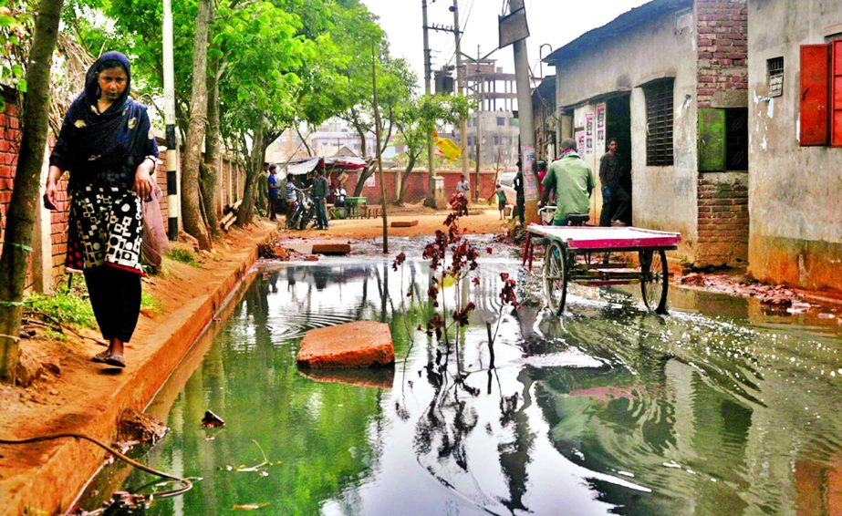 This thoroughfare located at city's Jurain area is in sorry state on dirty and sewage waters being logged for a few days due to poor drainage system. But the authority concern do not pay any heed to the matter causing sufferings to locals. This photo was