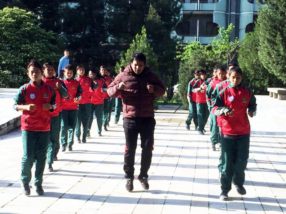 Members of Bangladesh under-14 girls' team took part a practice session in Tajikistan on Monday.