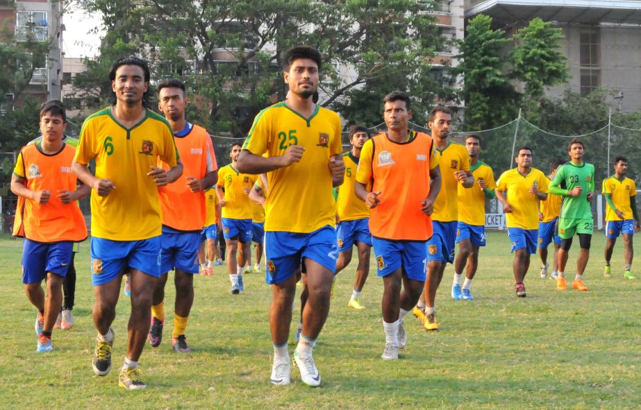 Players of Sheikh Jamal DC Limited during a practice session at Dhanmondi Club Ground on Monday.